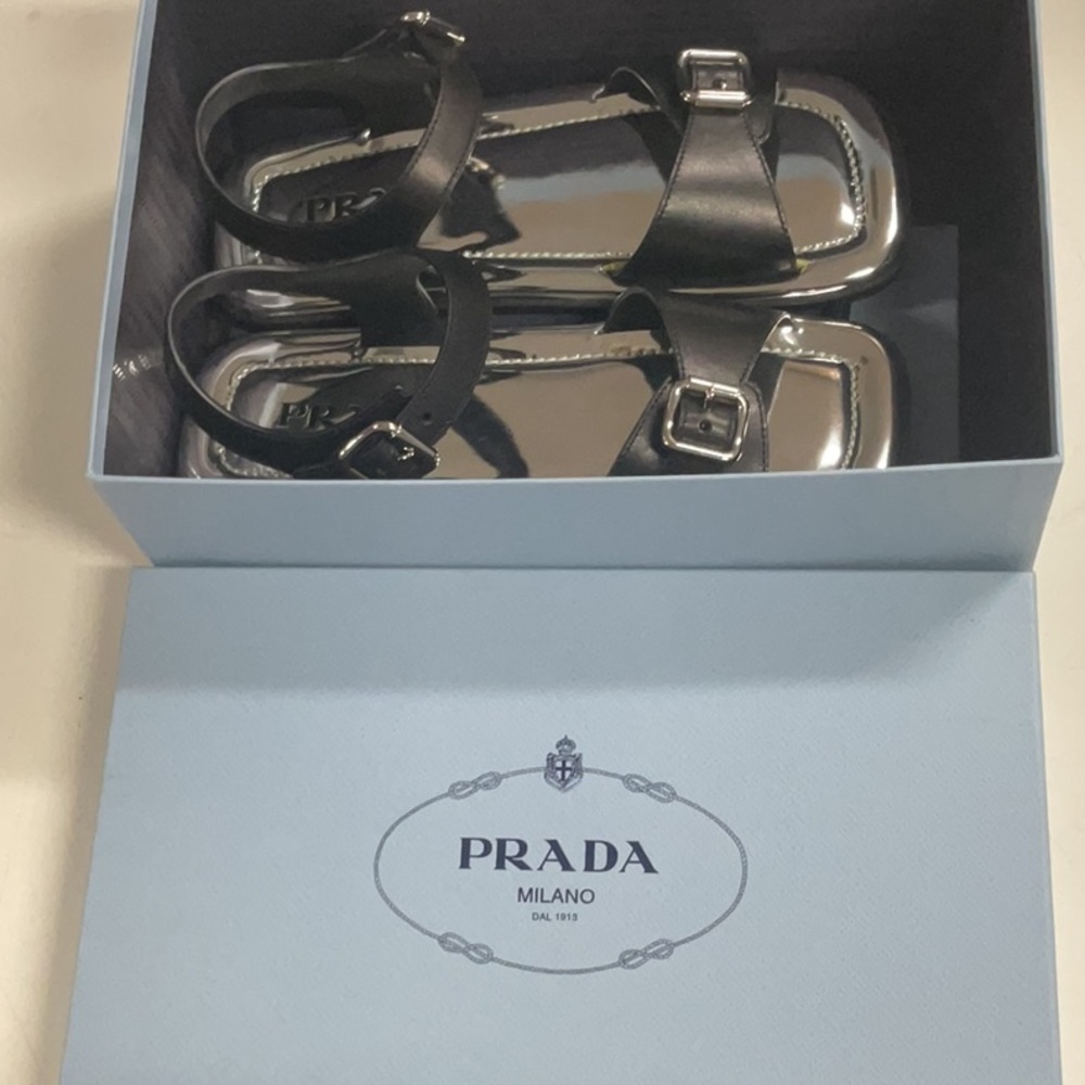 Prada Metallic Silver and Black Sandals NEW 7

U1-31 - Picture 2 of 4